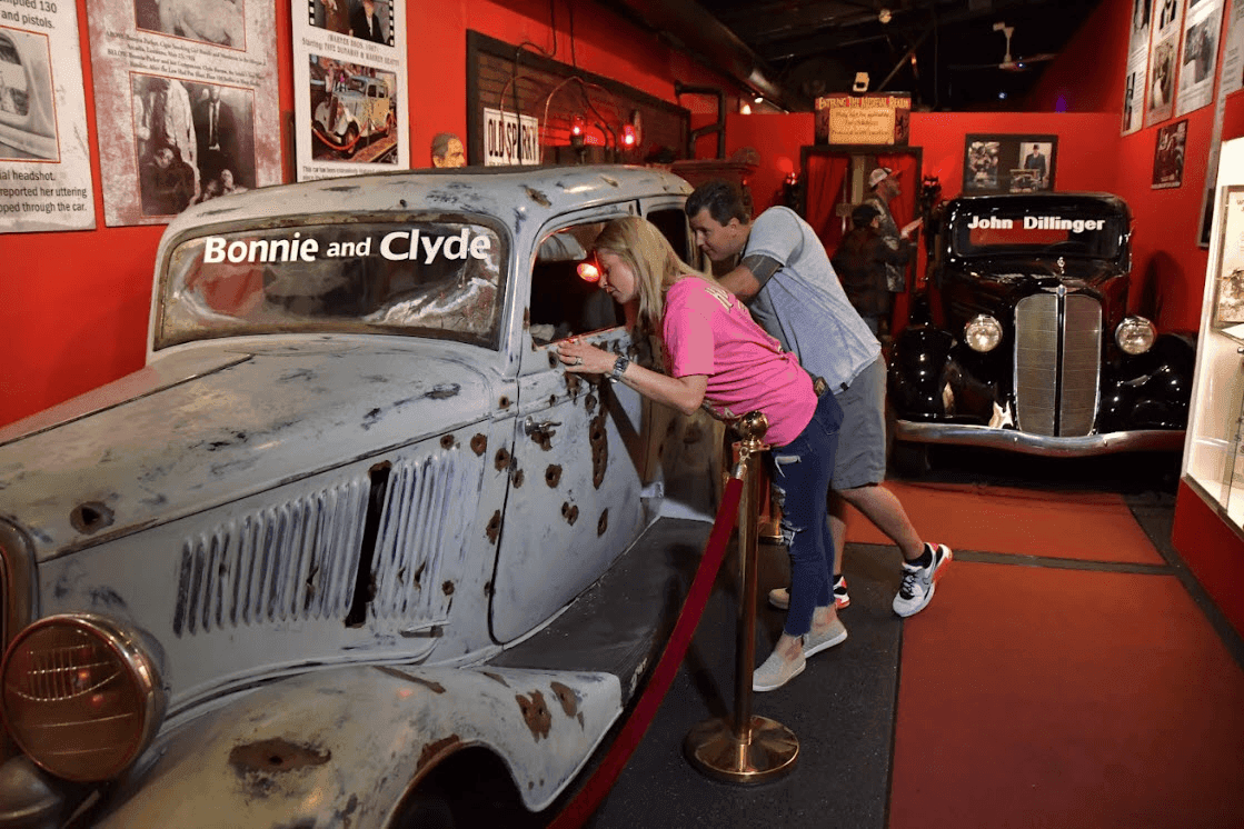 Bullet-riddled 1934 Ford “Bonnie and Clyde” car exhibit at Volo Fun museum, representing the famed outlaw duo’s death car