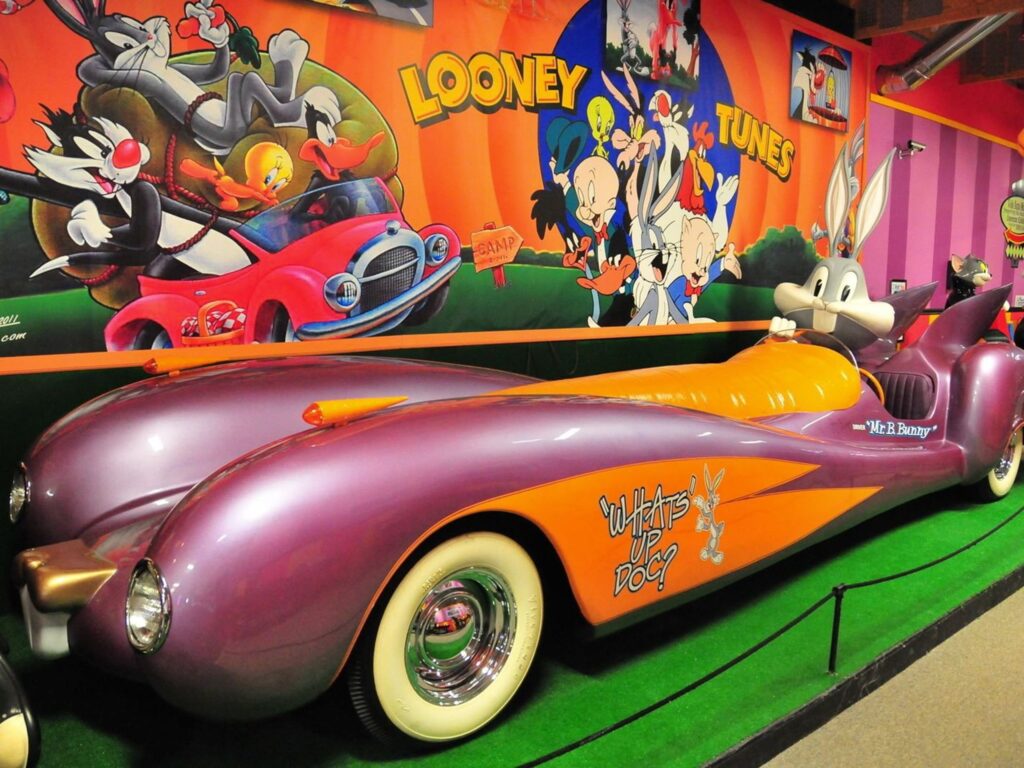 Colorful cartoon-themed vintage car display