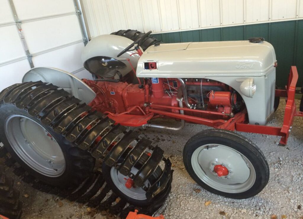 Vintage Ford tractor in garage