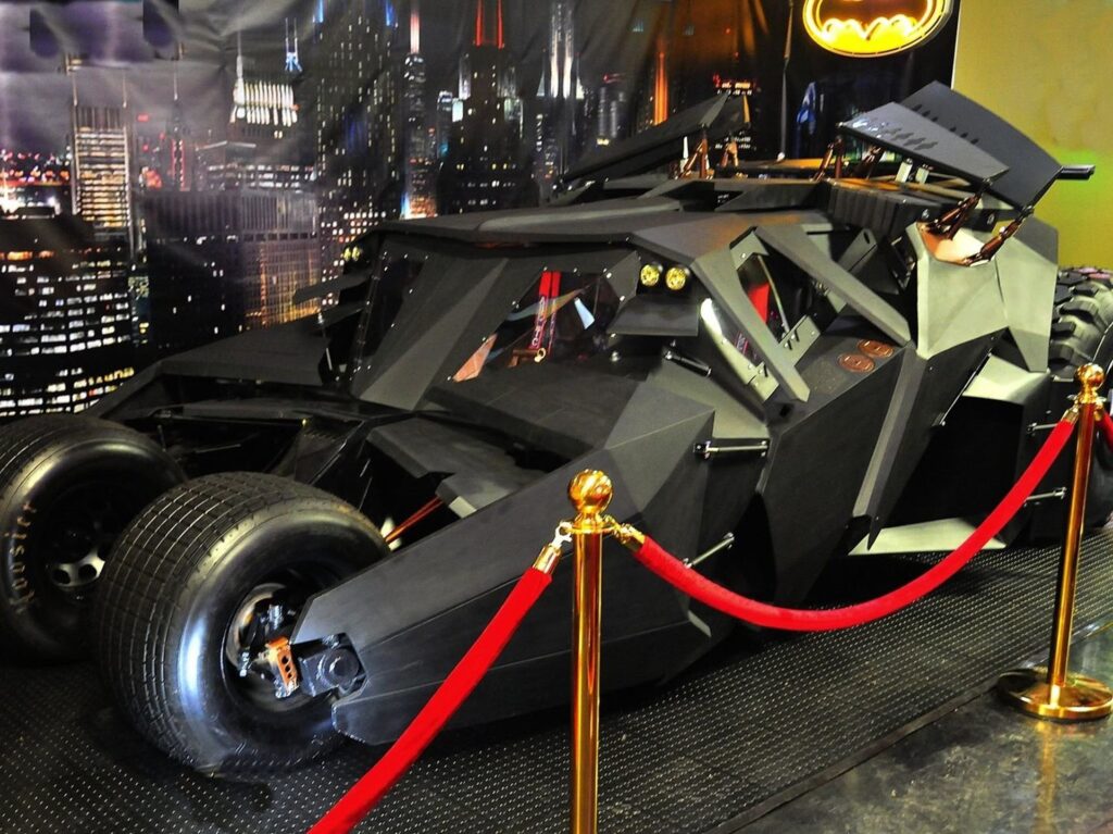 Black armored vehicle with large wheels