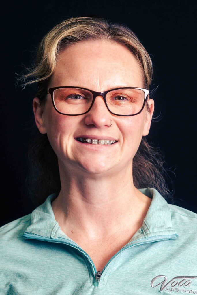 Woman in light blue jacket