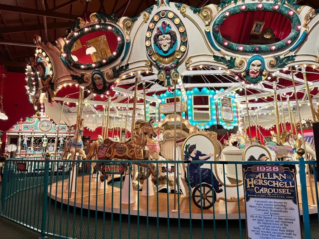 Vintage carousel with colorful horses.