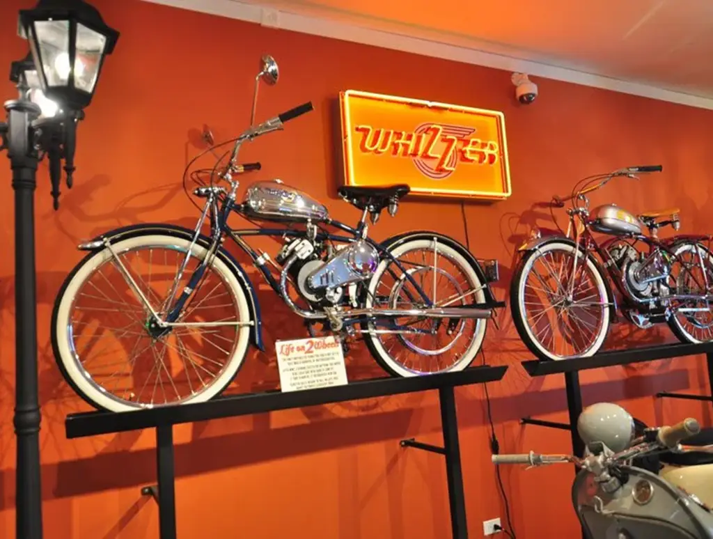 Vintage bicycles displayed on wall