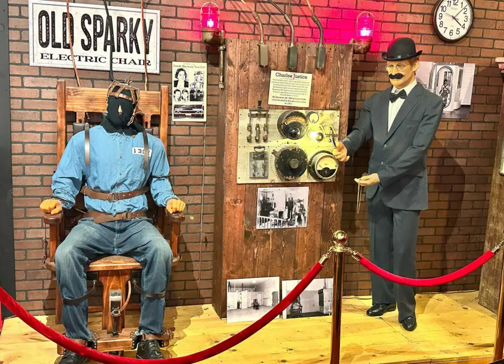 Electric chair exhibit with mannequin.