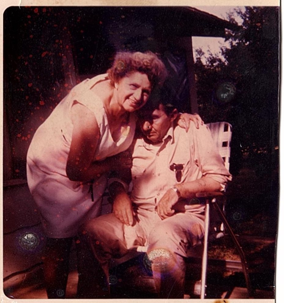 Couple sharing a tender moment outdoors.