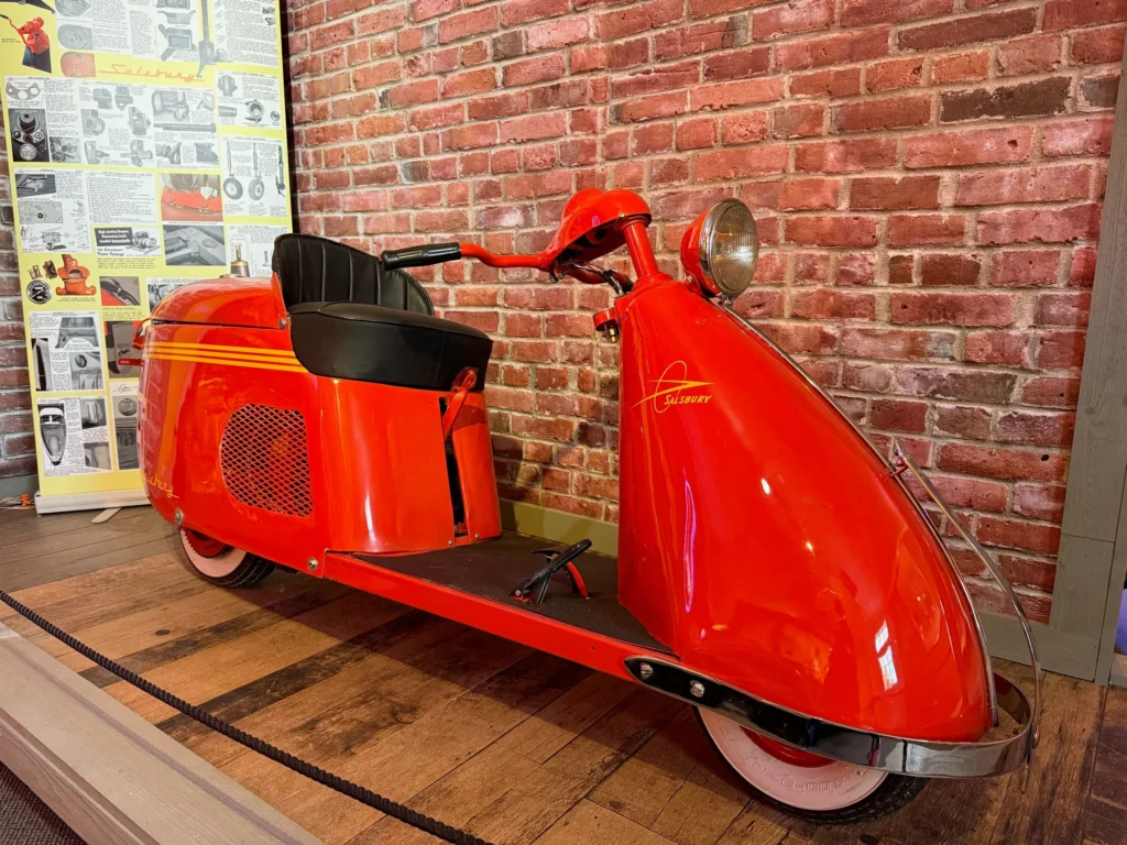Vintage red scooter on display