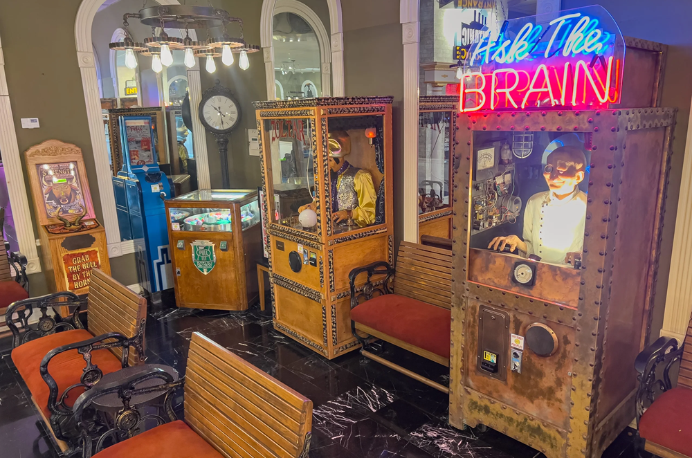 Vintage arcade machines and seating area.