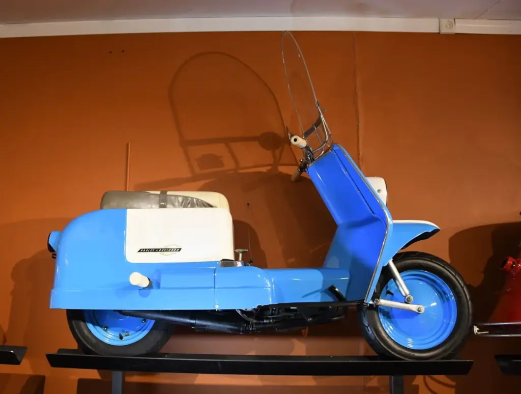 Vintage blue scooter on display
