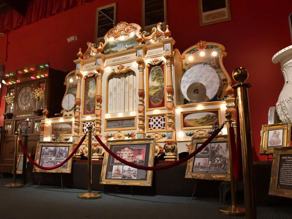 Ornate vintage organ display with artifacts
