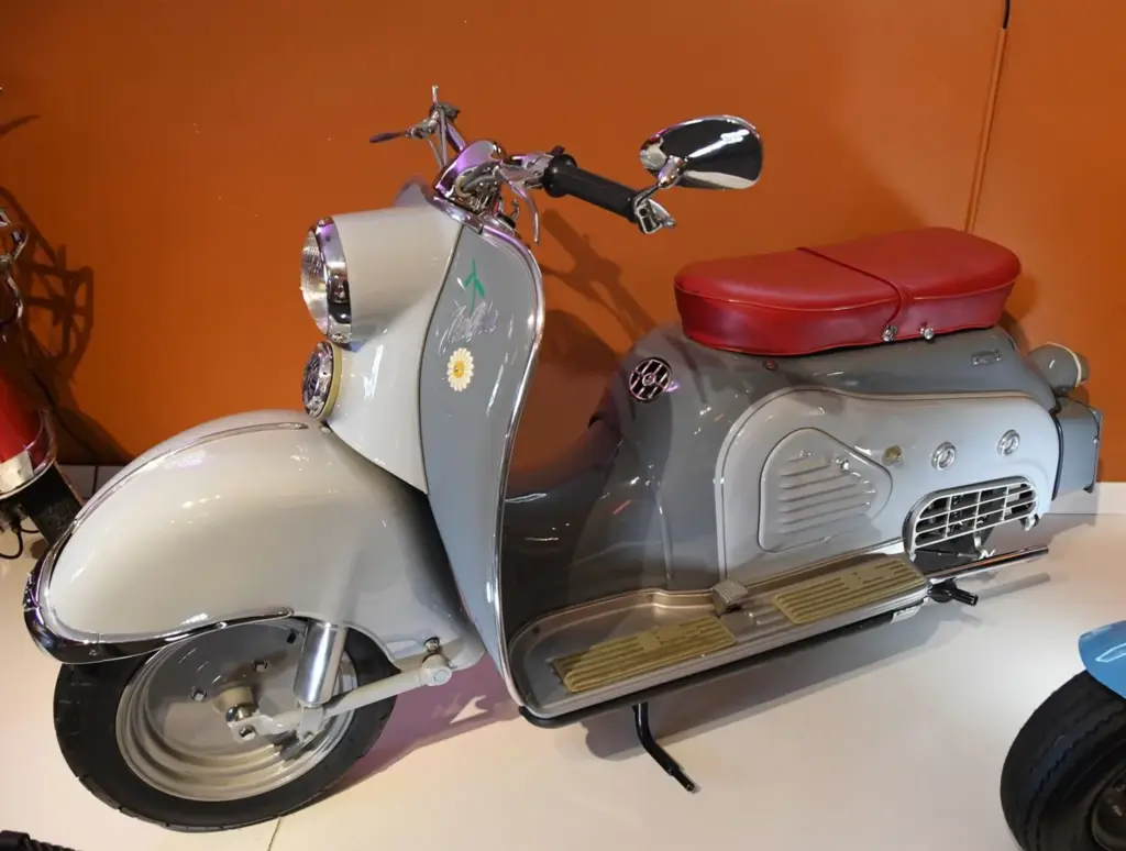 Vintage scooter with red seat