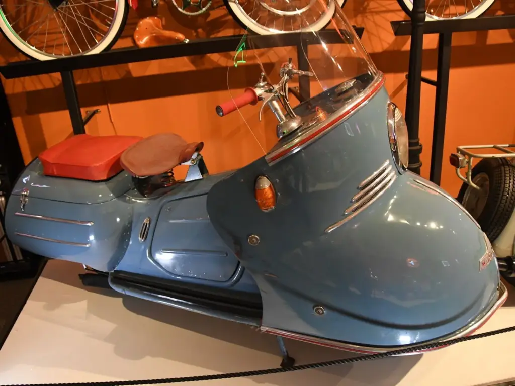 Vintage blue scooter with sidecar