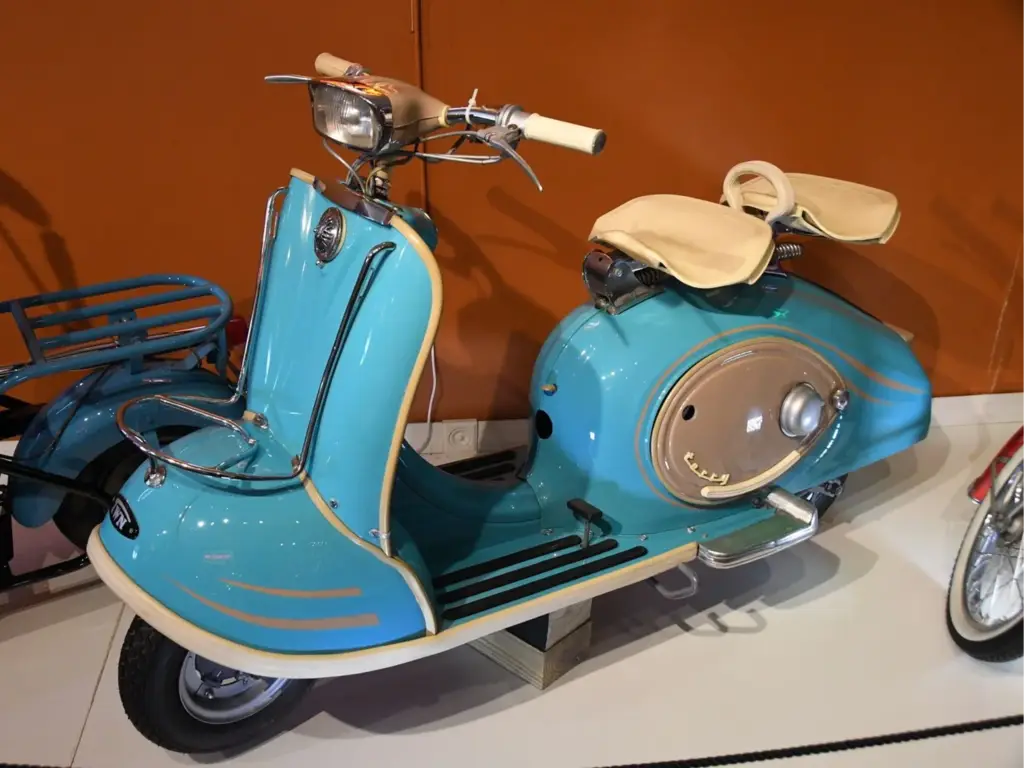 Vintage blue scooter with beige seat