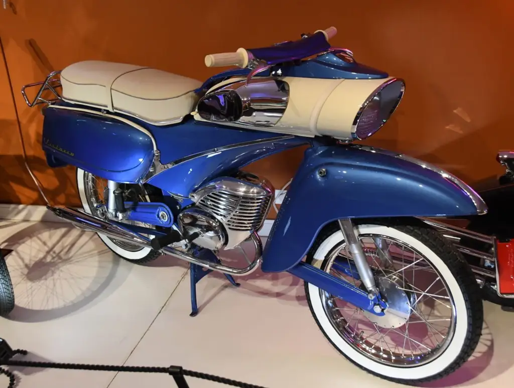 Vintage blue motorcycle with white accents
