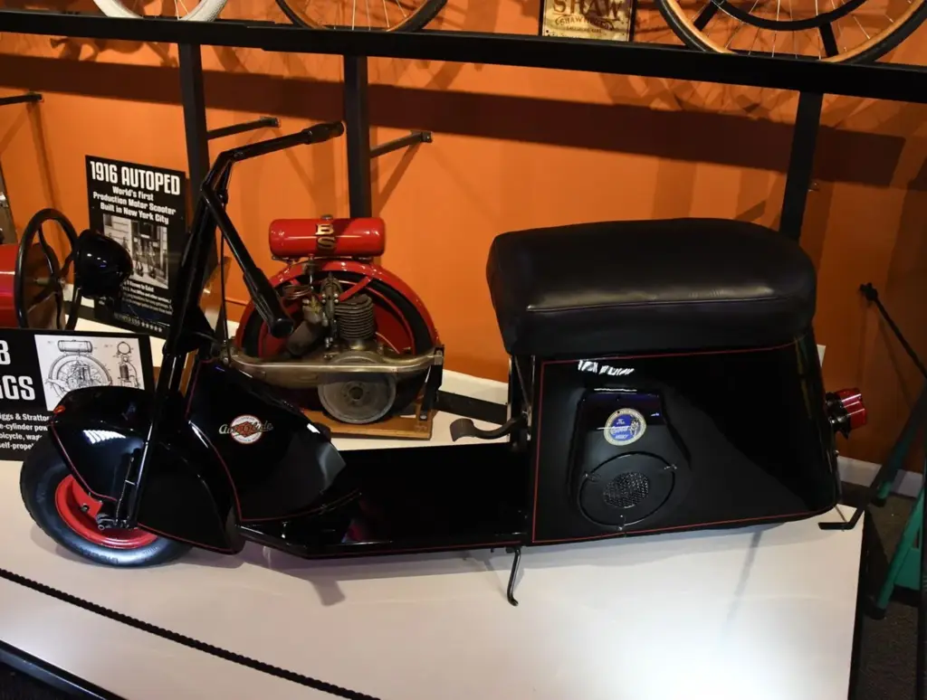 Vintage black scooter with red accents