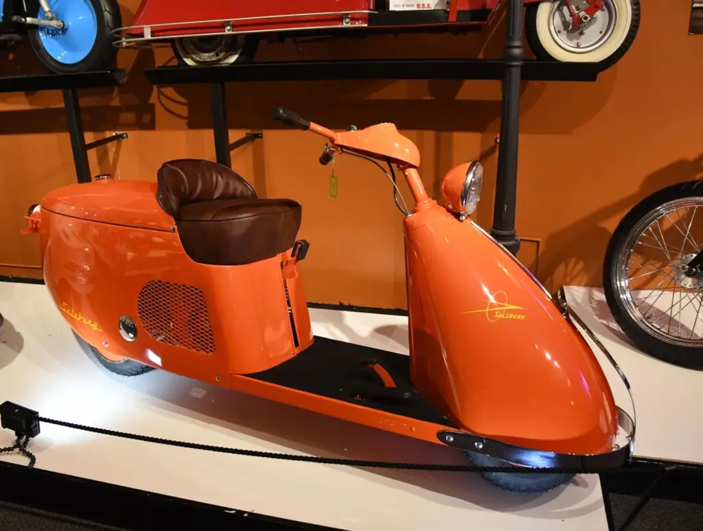 vintage orange scooter with sidecar