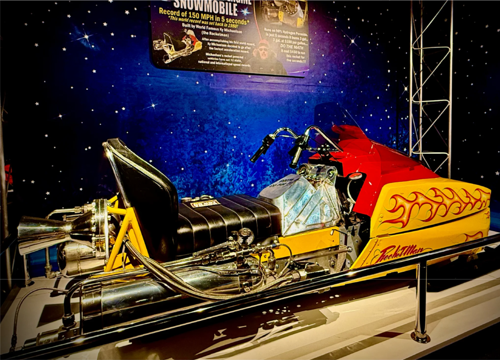 Rocket-powered snowmobile with flame design