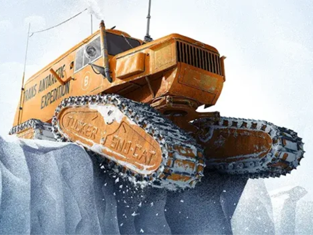 Orange vehicle on snowy terrain