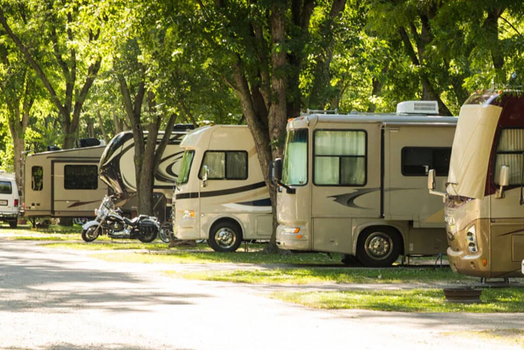 Fish Lake Beach Camping Resort in Volo, IL, is a family-friendly destination featuring an 80-acre lake with a sandy beach, swimming, fishing, and boating