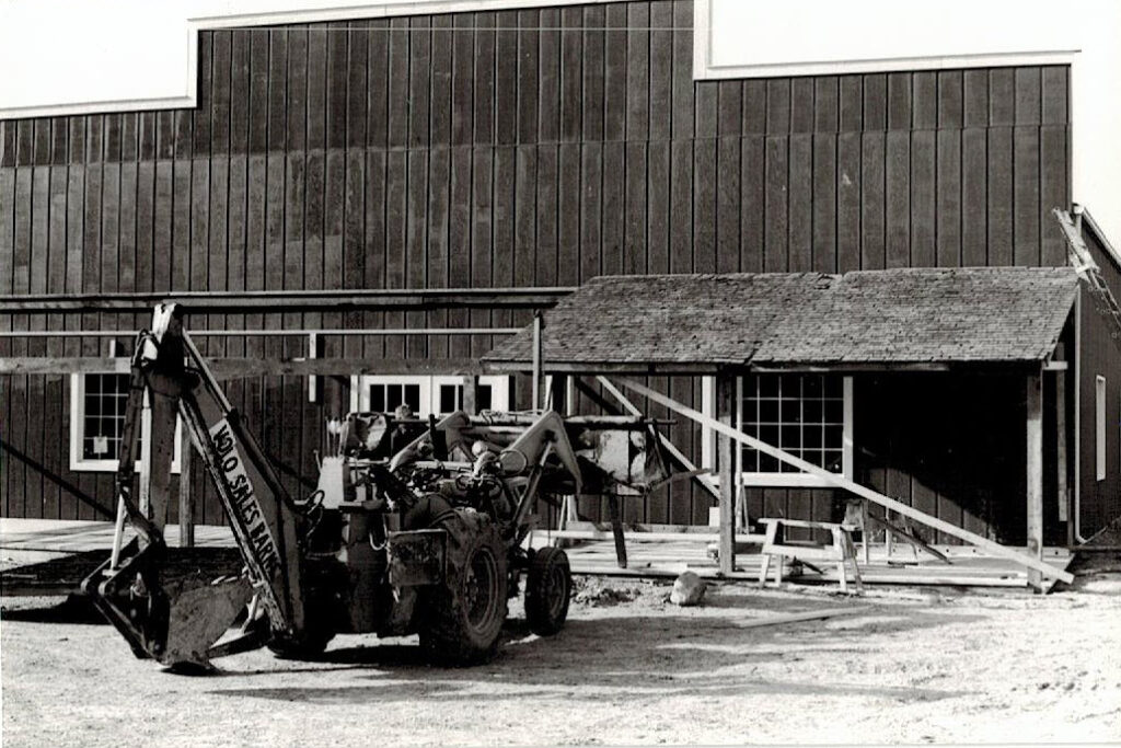 Construction site with machinery and building