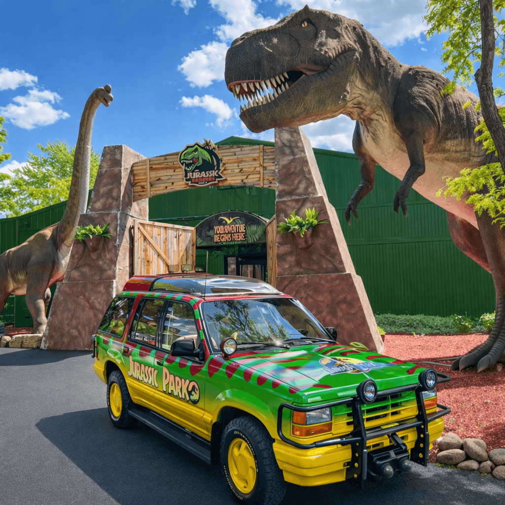 Jurassic Gardens themed entrance with vehicle