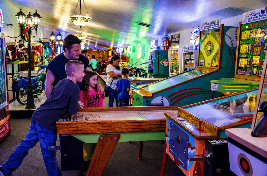 Family enjoying arcade games together.