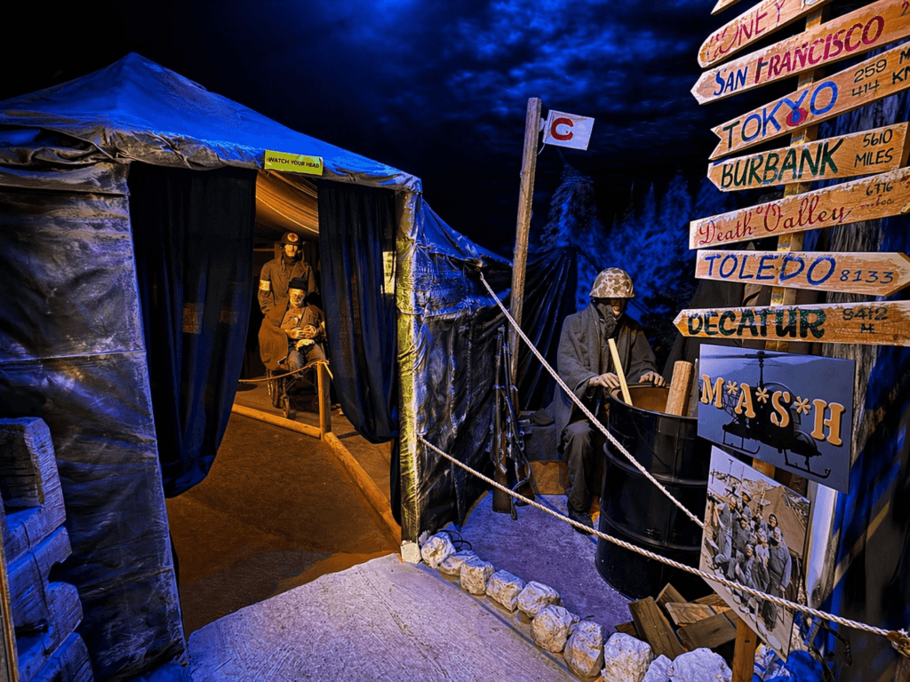 Military tent with mannequins and signs