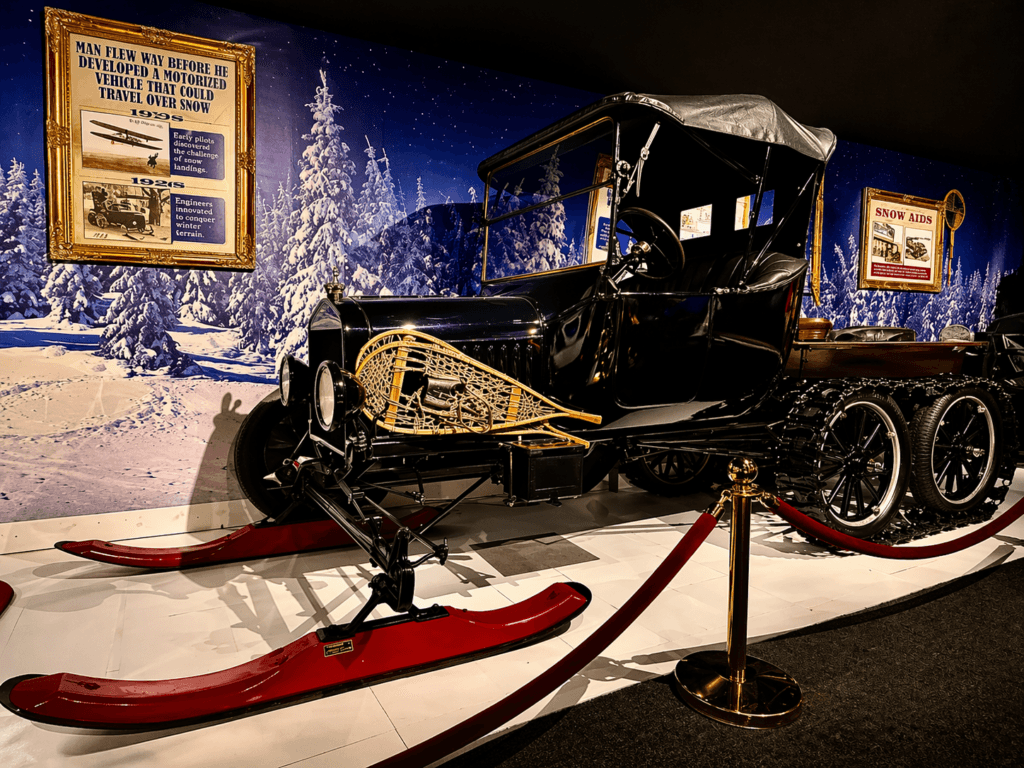 Vintage car on skis in museum