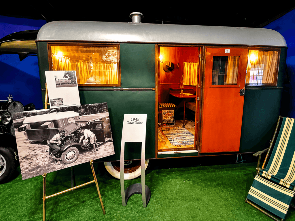 Vintage travel trailer display with photos