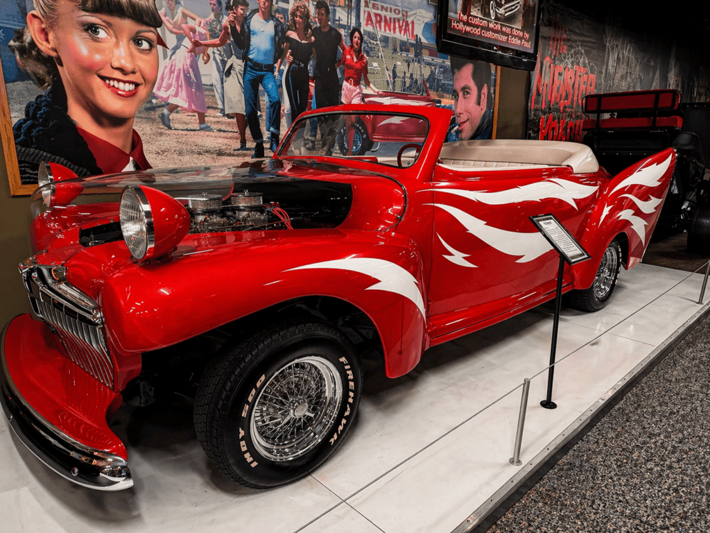 Classic red convertible with white flames from the movie grease on display at volo museum