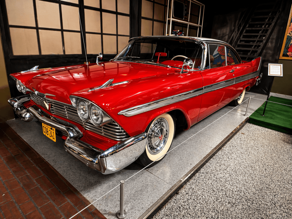 Classic red vintage car from the Stephen King Movie Carrie on display at volo museum