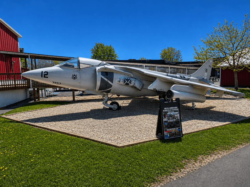 Military aircraft displayed outdoors.