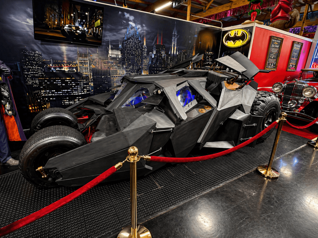 Batmobile displayed in a museum setting