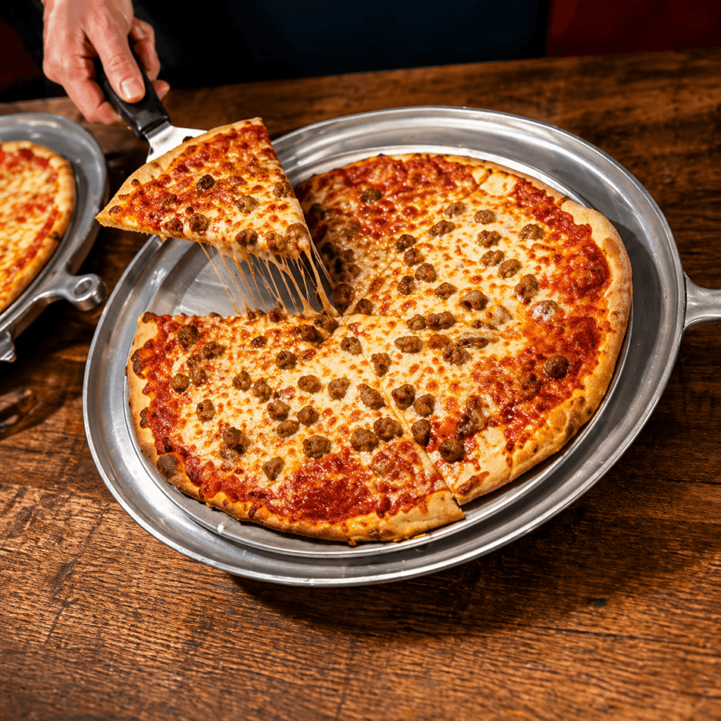 Delicious pizza with cheese and sausage toppings