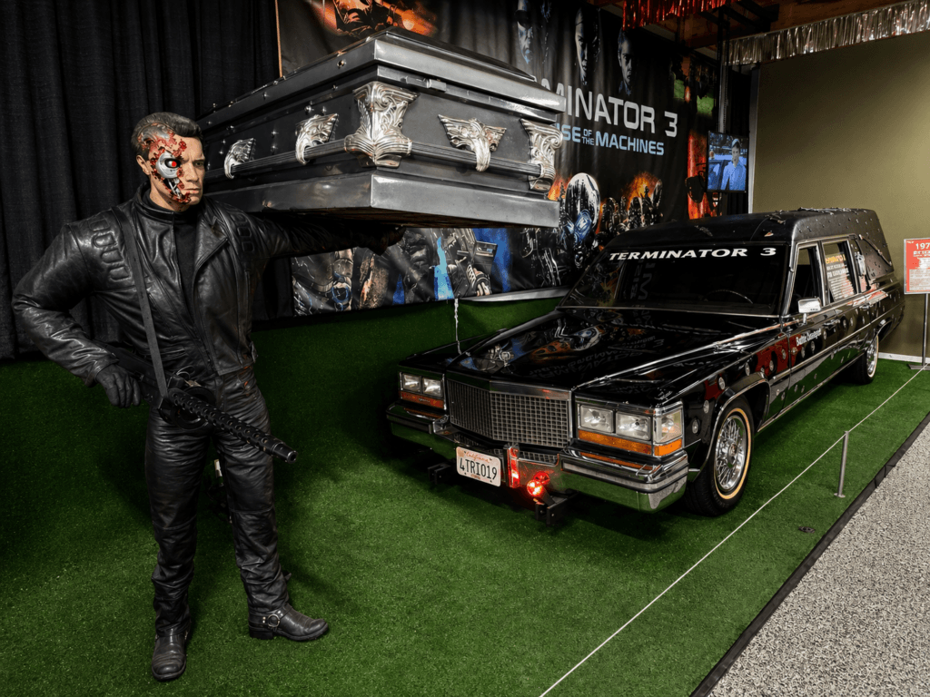 Terminator statue with themed hearse at volo museum