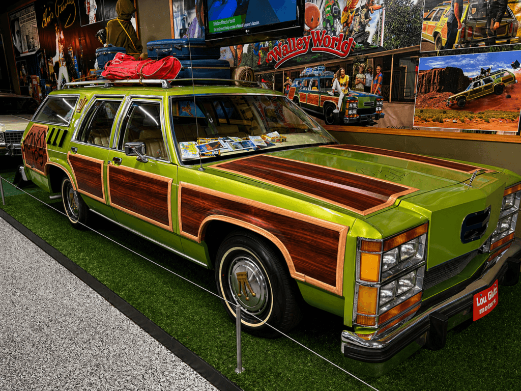 Classic green station King family Truckster wagon on display