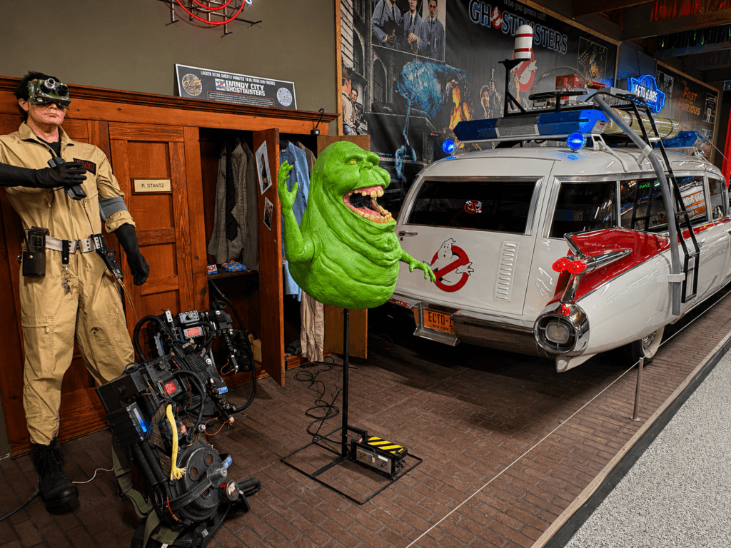 Ghostbusters display with iconic vehicle