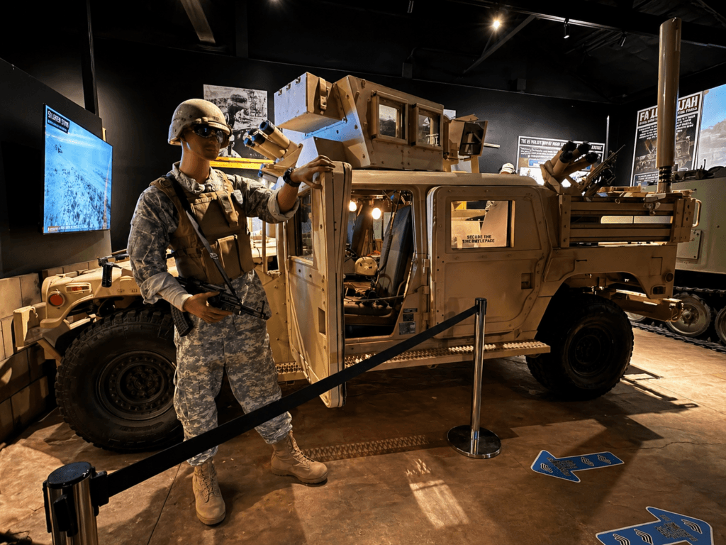 Military exhibit with Humvee and soldier