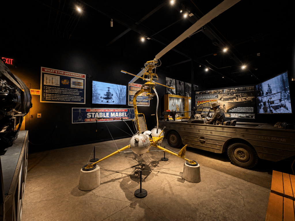 Museum exhibit featuring historical vehicles.
