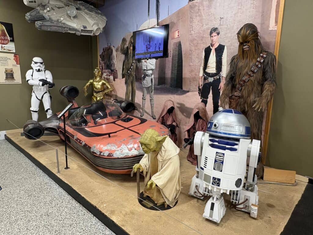 Star wars landspeeder diorama on display at volo museum.
