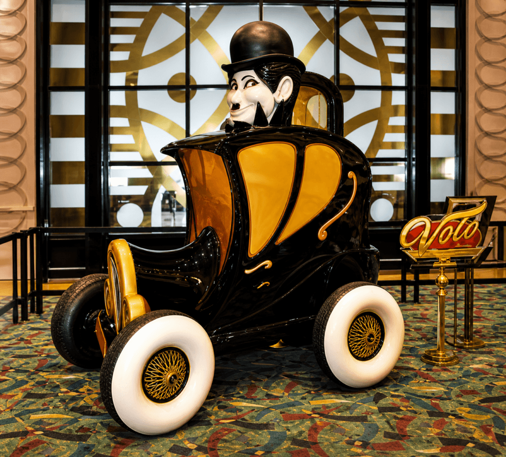 Vintage car with whimsical charlie chaplin character