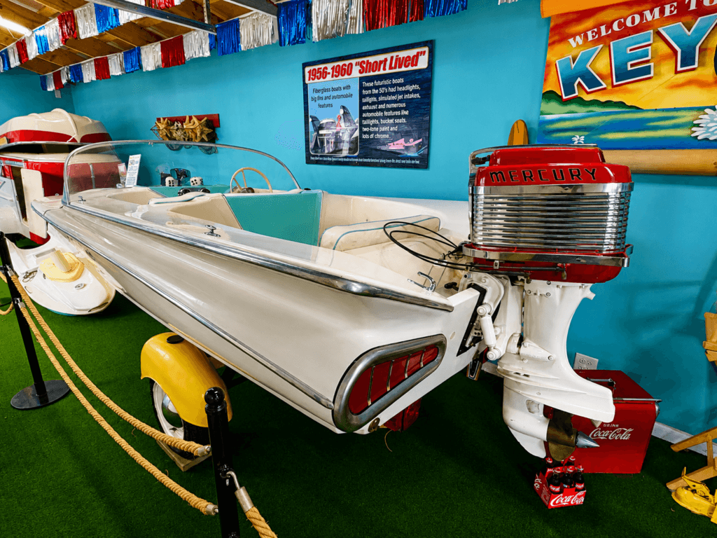 Vintage boat displayed in colorful room