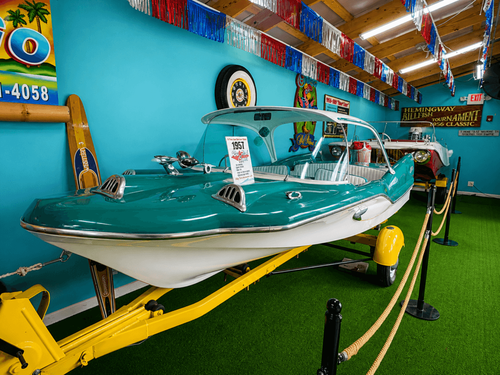 Vintage boat displayed in colorful room