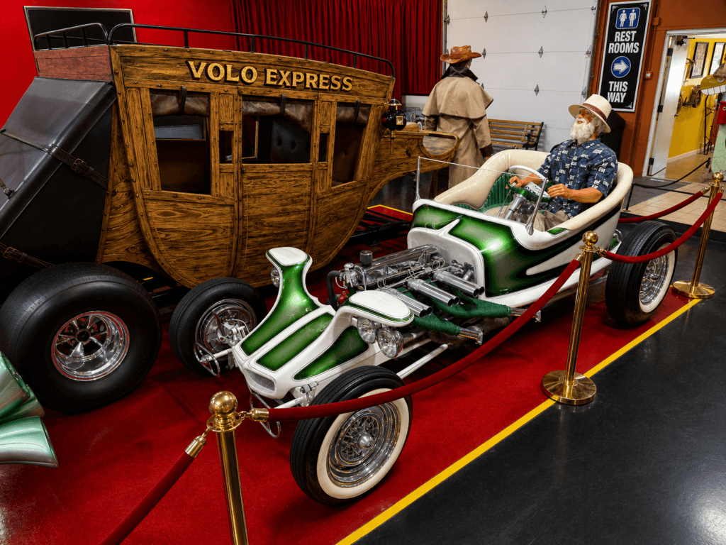 Unique vintage car display with mannequin