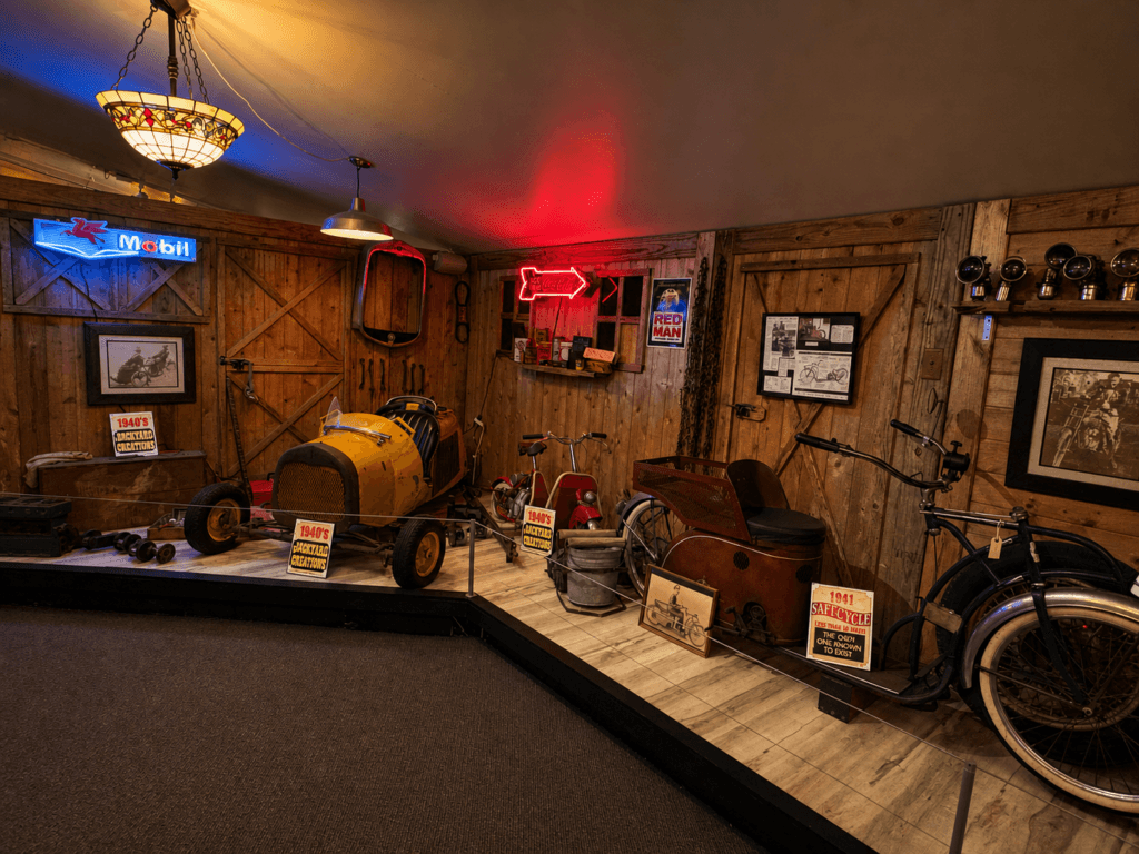 Vintage vehicles in a rustic setting.
