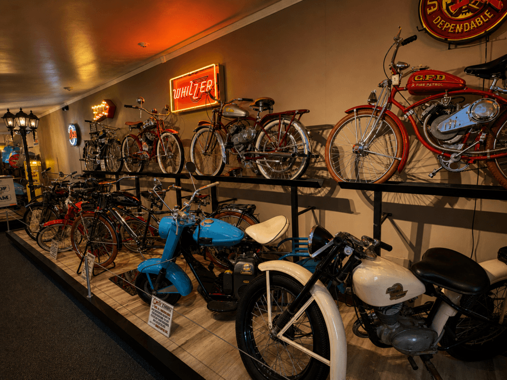 Vintage motorcycles displayed in a museum