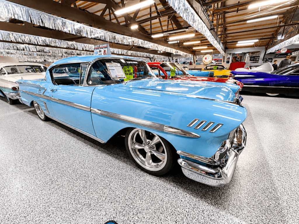 Classic blue car in showroom