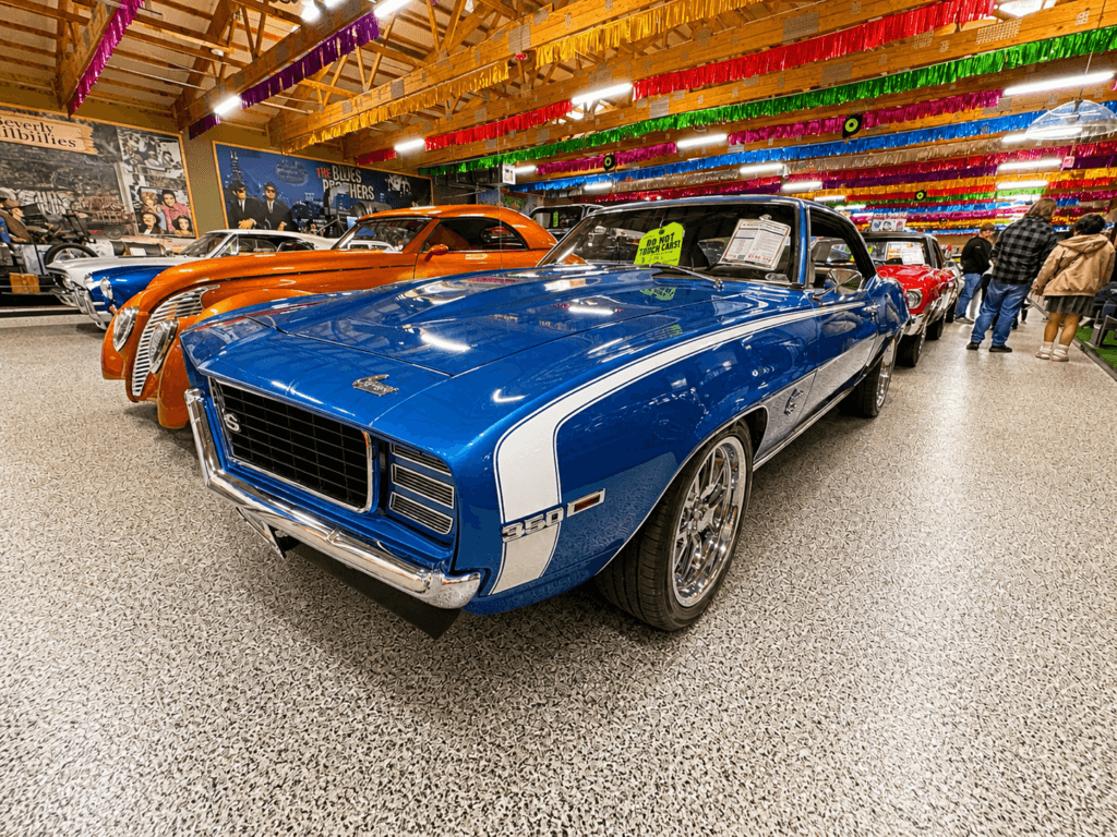 Classic blue camaro muscle car in showroom