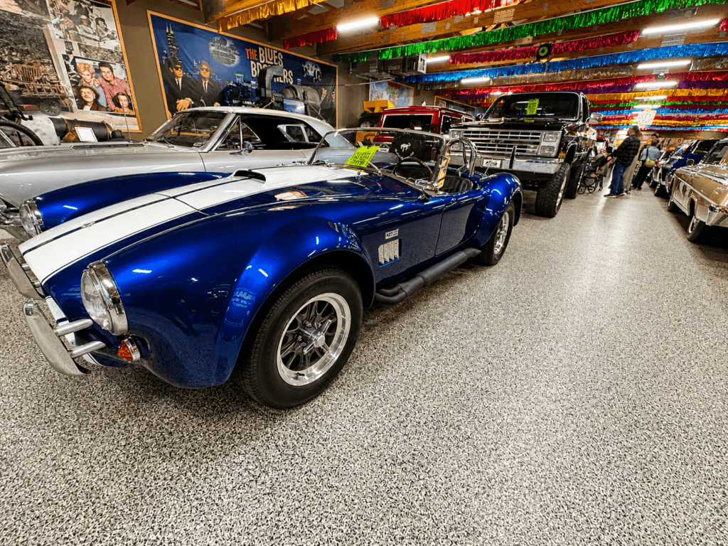 Classic blue Shelby sports car in showroom