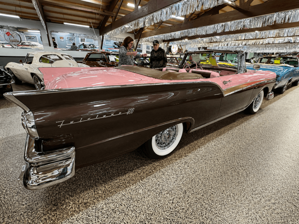 Classic pink and brown convertible car