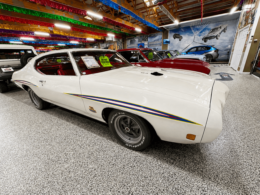 Classic white muscle car in showroom